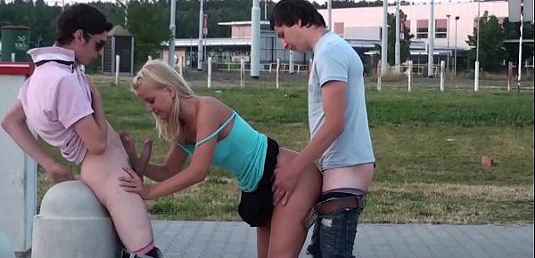  A young blonde pretty girl in public threesome gang bang